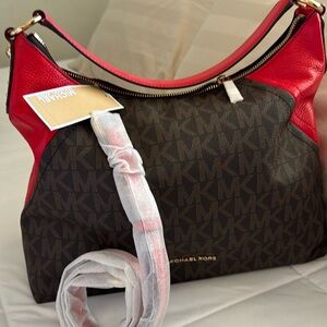 Michael Kors purse with crossbody belt